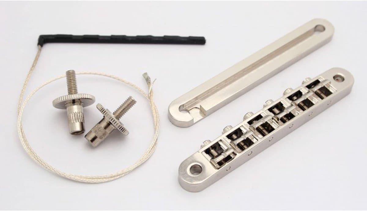 Duesenberg Duesenberg Piezo Bridge nikkel, afstand bouten 73,5mm - Gitaaronderdeel