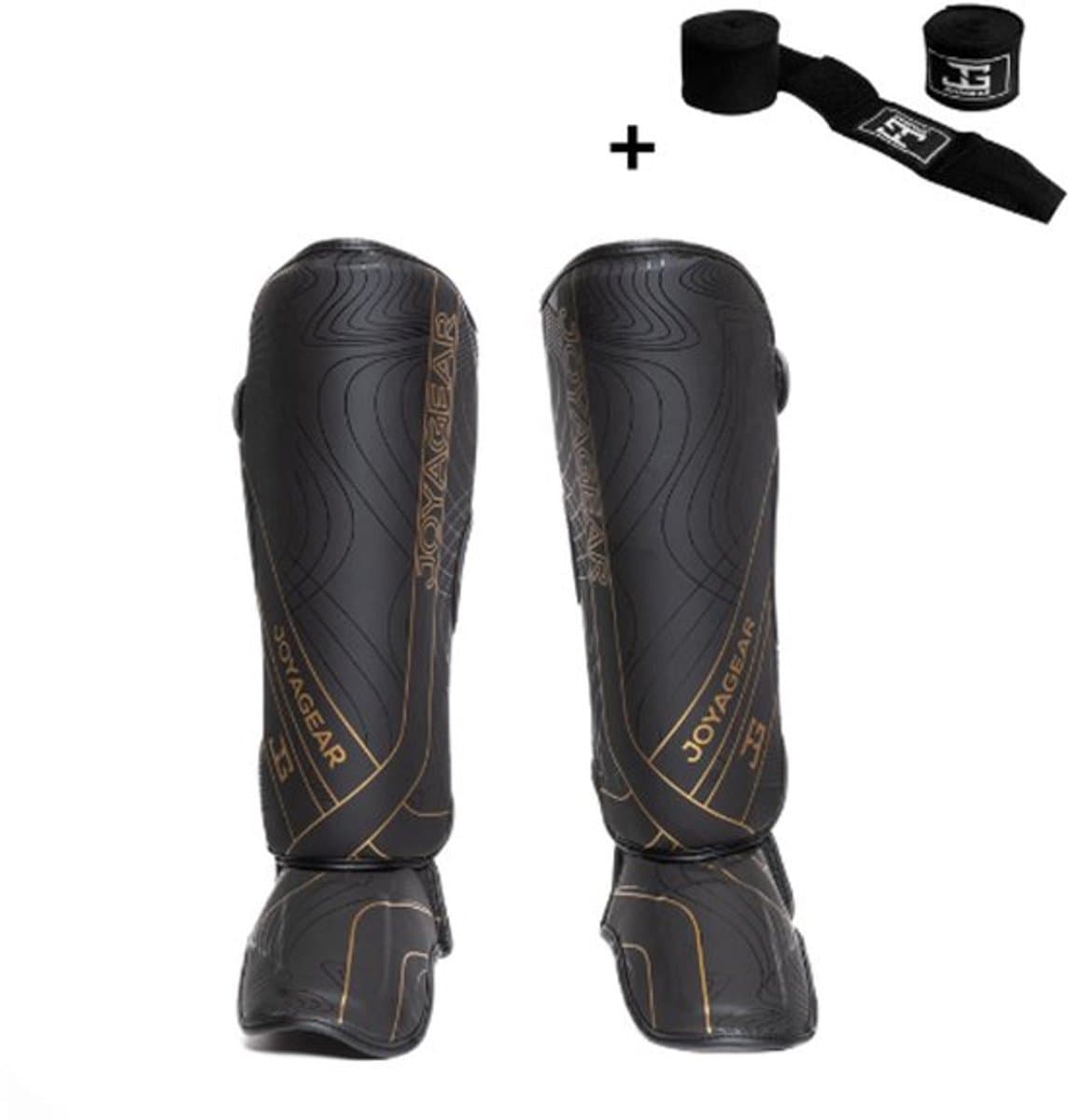 Joya ESSENTIAL Scheenbeschermers – Maat S – Zwart/Goud – Kickboksen/Muay Thai/MMA – Ergonomische pasvorm, schokabsorberende padding – Inclusief Bandage