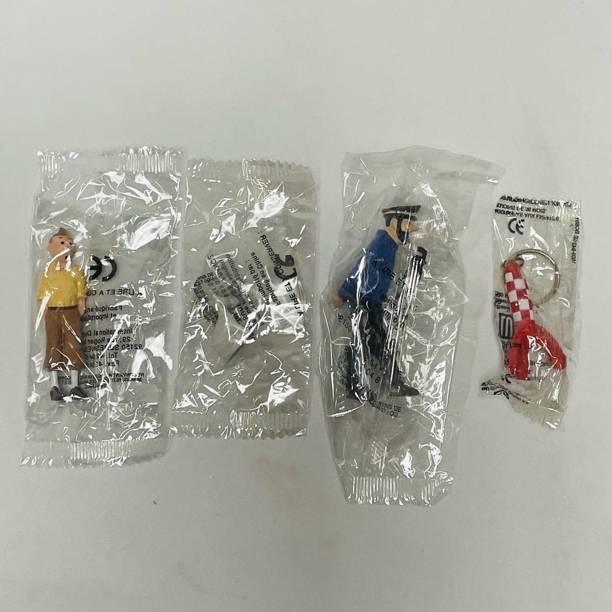 Zeldzame set 4x Kuifje PVC premiums LU 1994, new in flow pack Haddock Bobbie Raket - Collectable